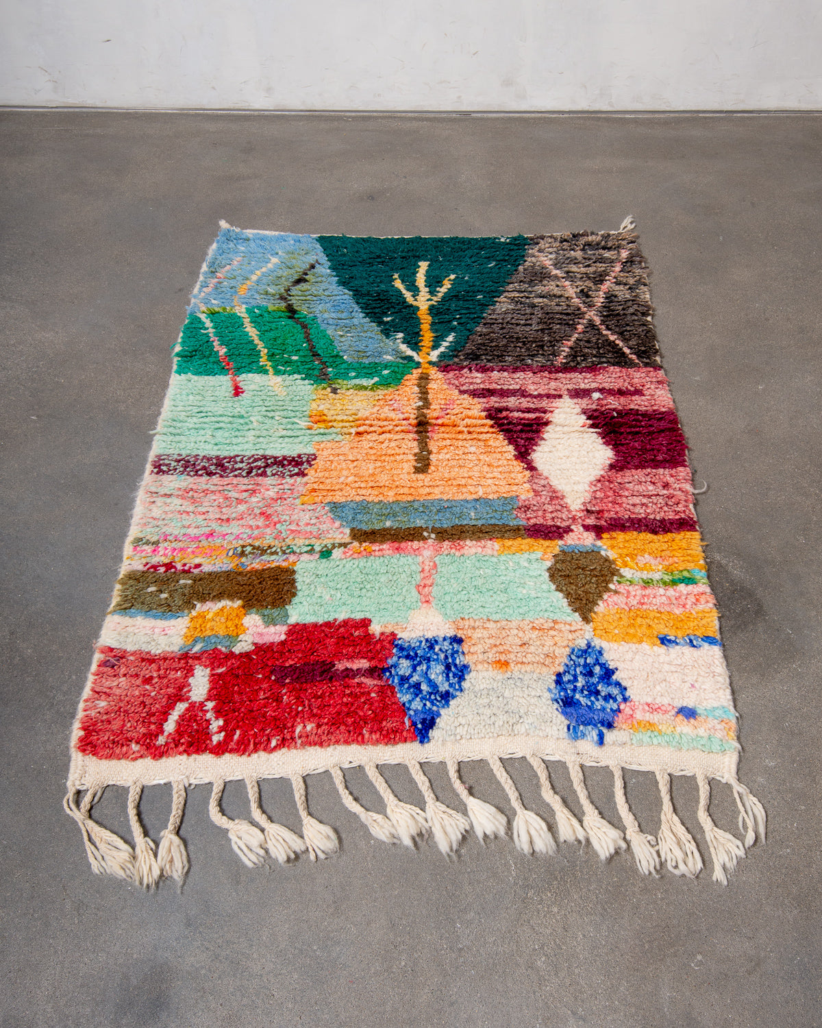 Modern, designer, handcrafted Berber rug from Morocco. Vintage carpet with beautiful colours and patterns and fluffy texture.